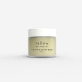 Jar of Tallow Me Pretty Tallow & Honey Balm, with creamy honey-colored contents, displaying its natural and organic ingredients for versatile skin care.