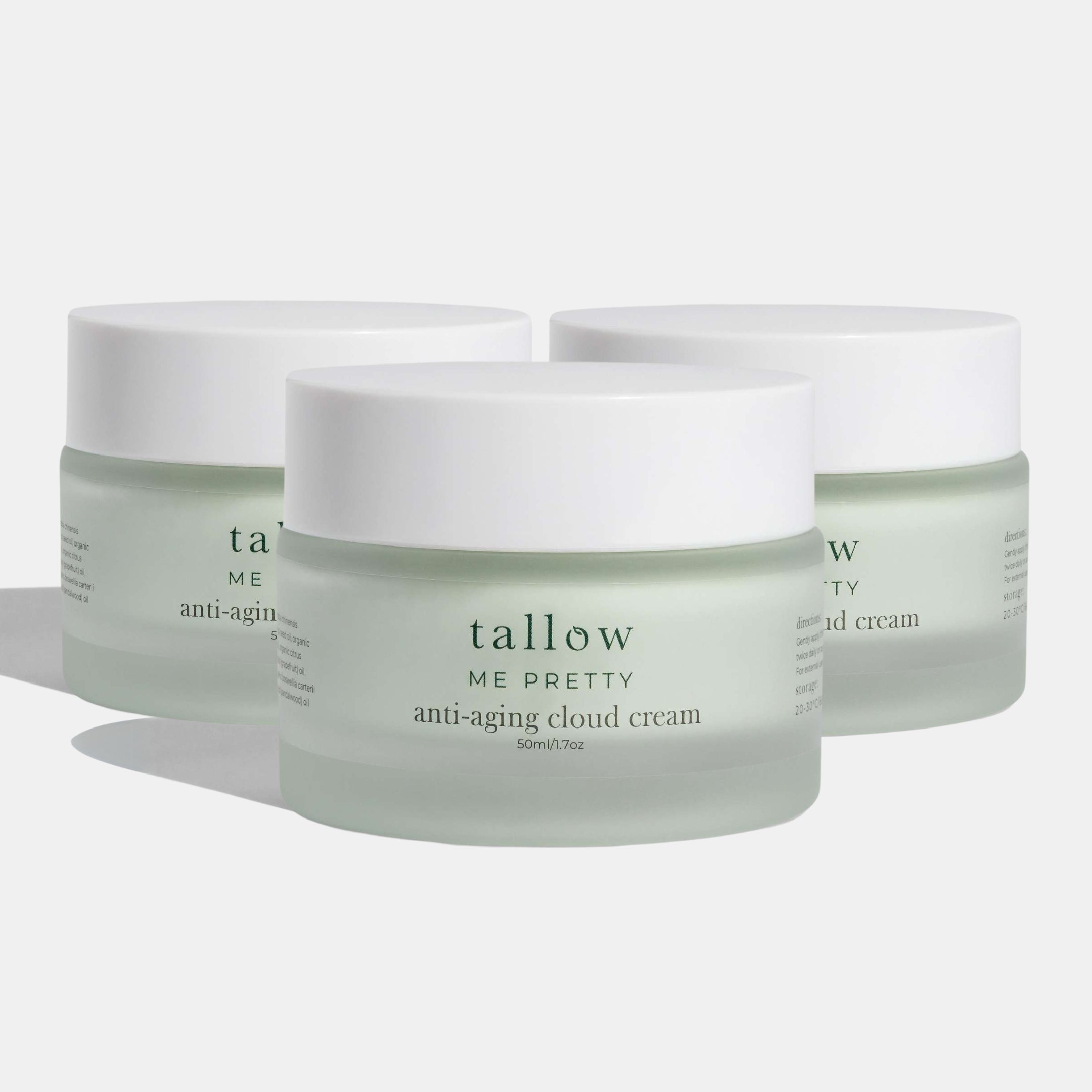 Three pack of Tallow Me Pretty's anti-aging tallow cloud cream on a white background with slight shadows. 